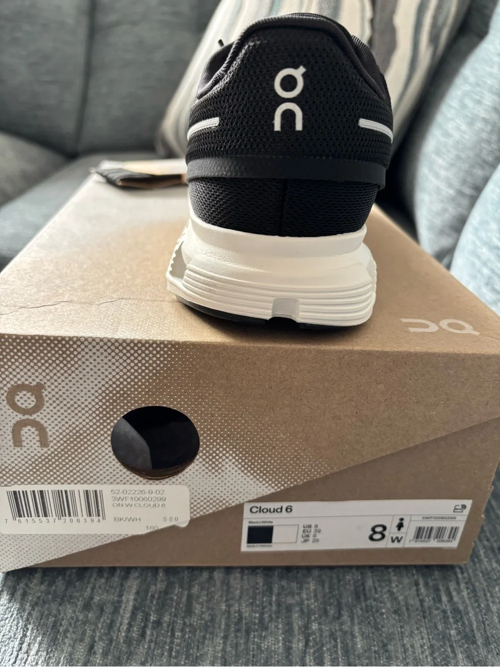 On Cloud Running Shoe Women's Black and White Cloud Sneaker